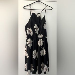Charlotte Russe mini floral dress. Size L. Black dress, white floral design.